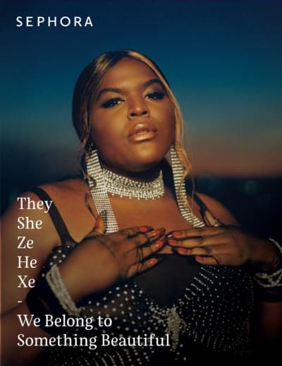 woman with her hands resting on her chest