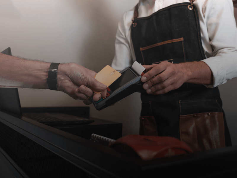 client paying barber