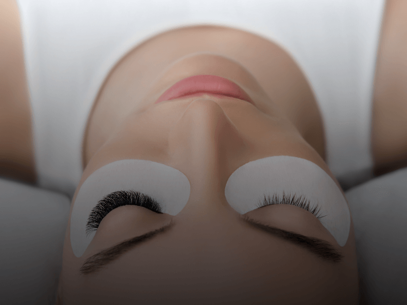 a person getting lash extensions