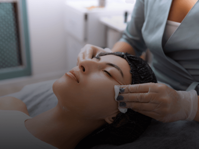 a person getting a facial massage