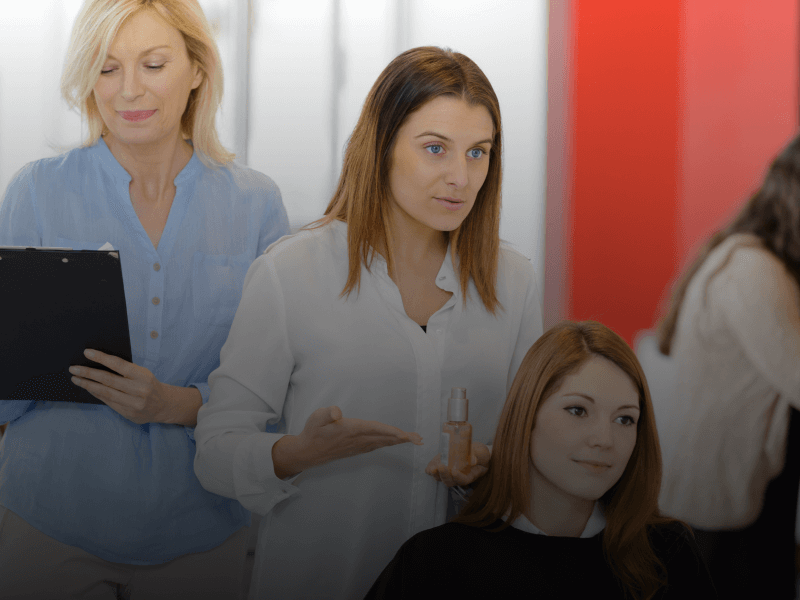 esthetician showing product to client