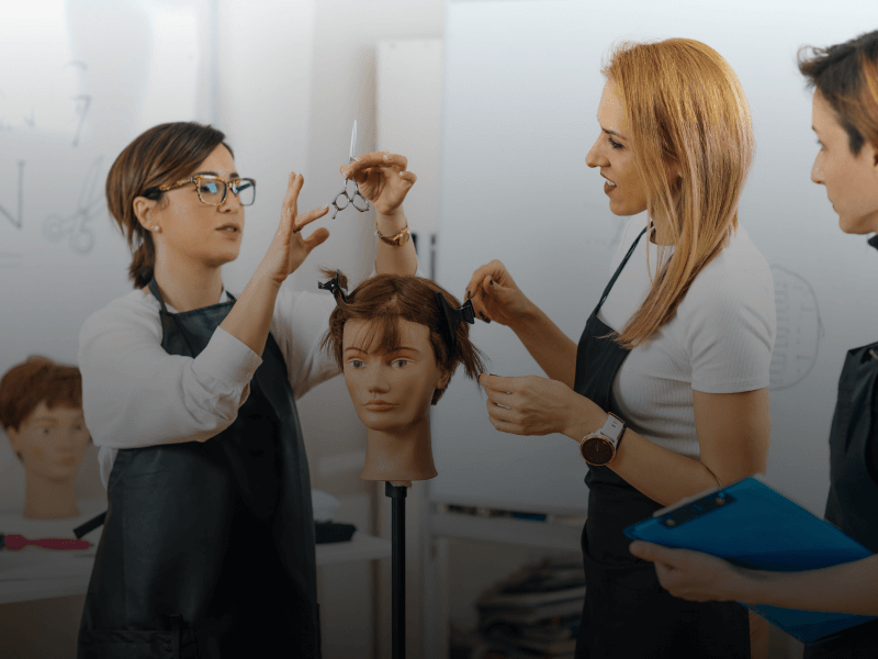 a person cutting a hair